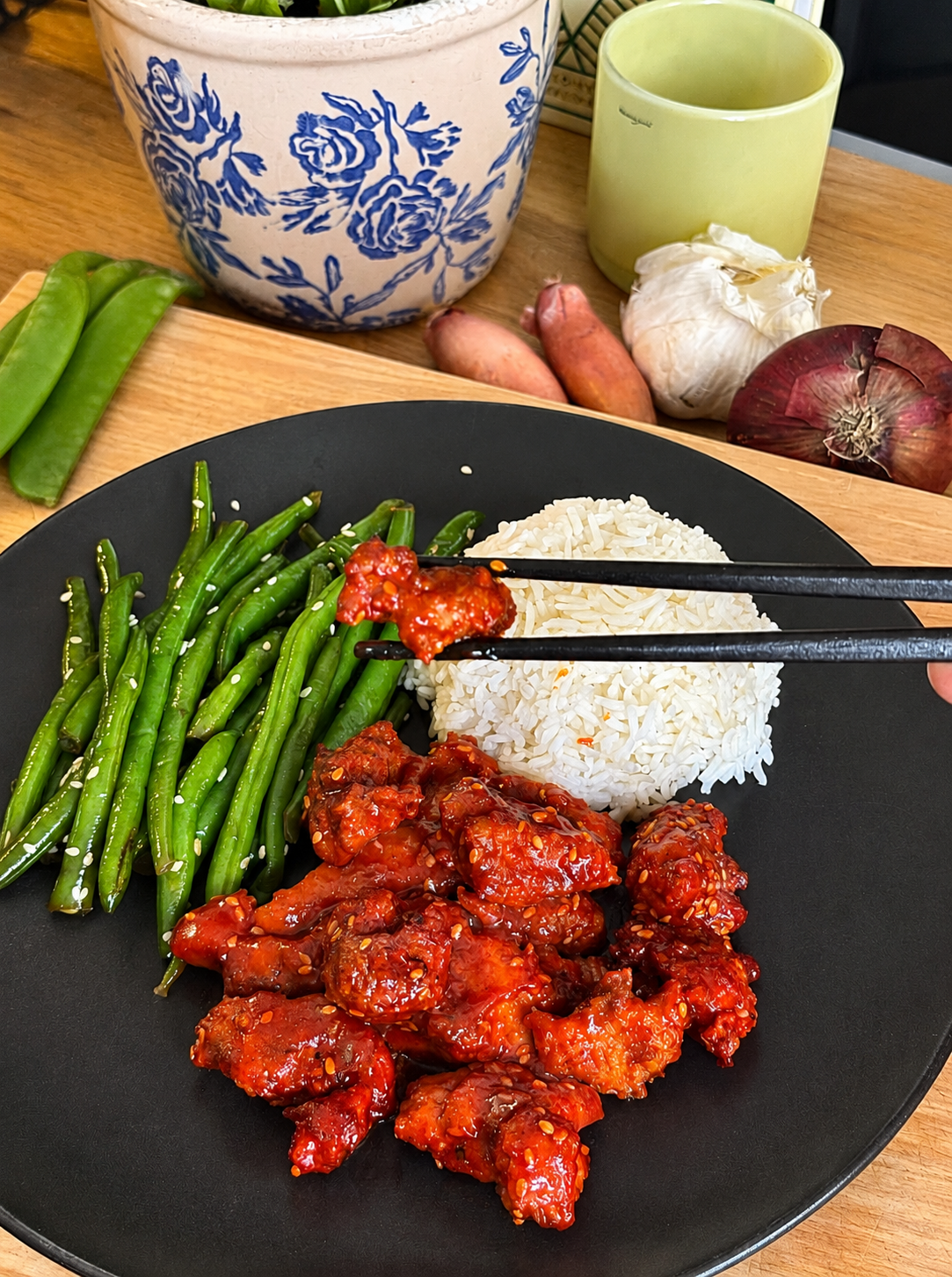 Sticky orange chicken with green beans and rice
